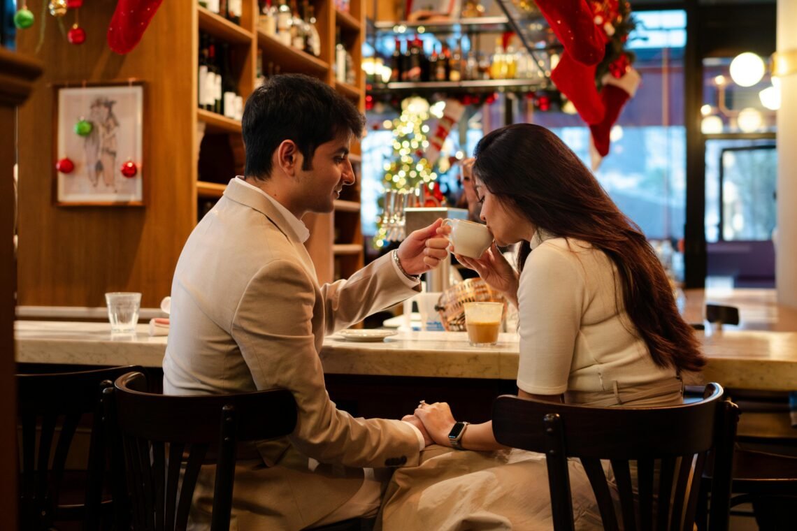 Romantic Couple Enjoying Coffee in a Cozy Cafe