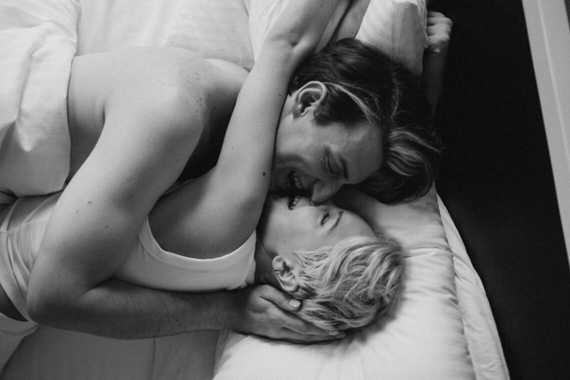 Couple in Lying on Bed